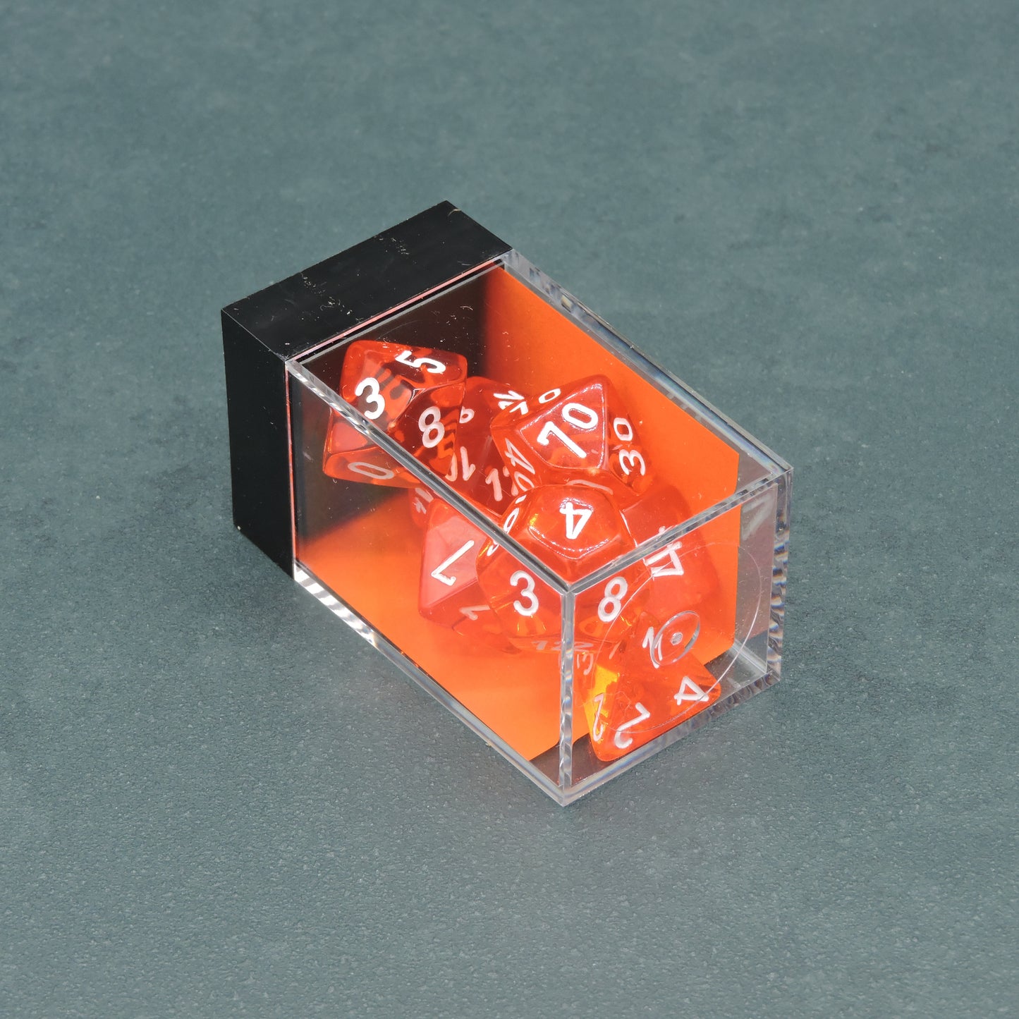 Orange w/ white Translucent Polyhedral 7-die Set