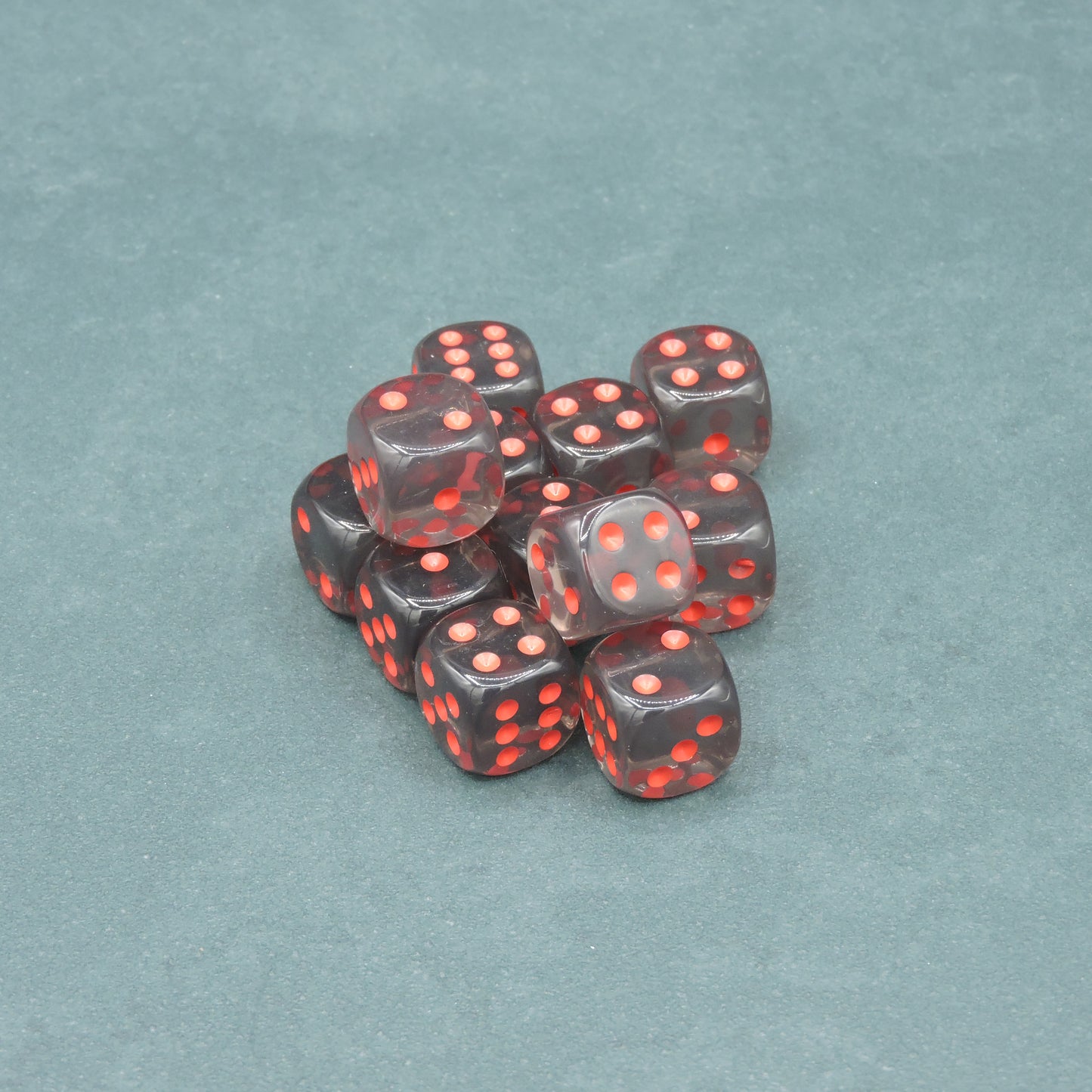 Smoke w/ red Translucent 16mm d6 Dice Block (12 dice)