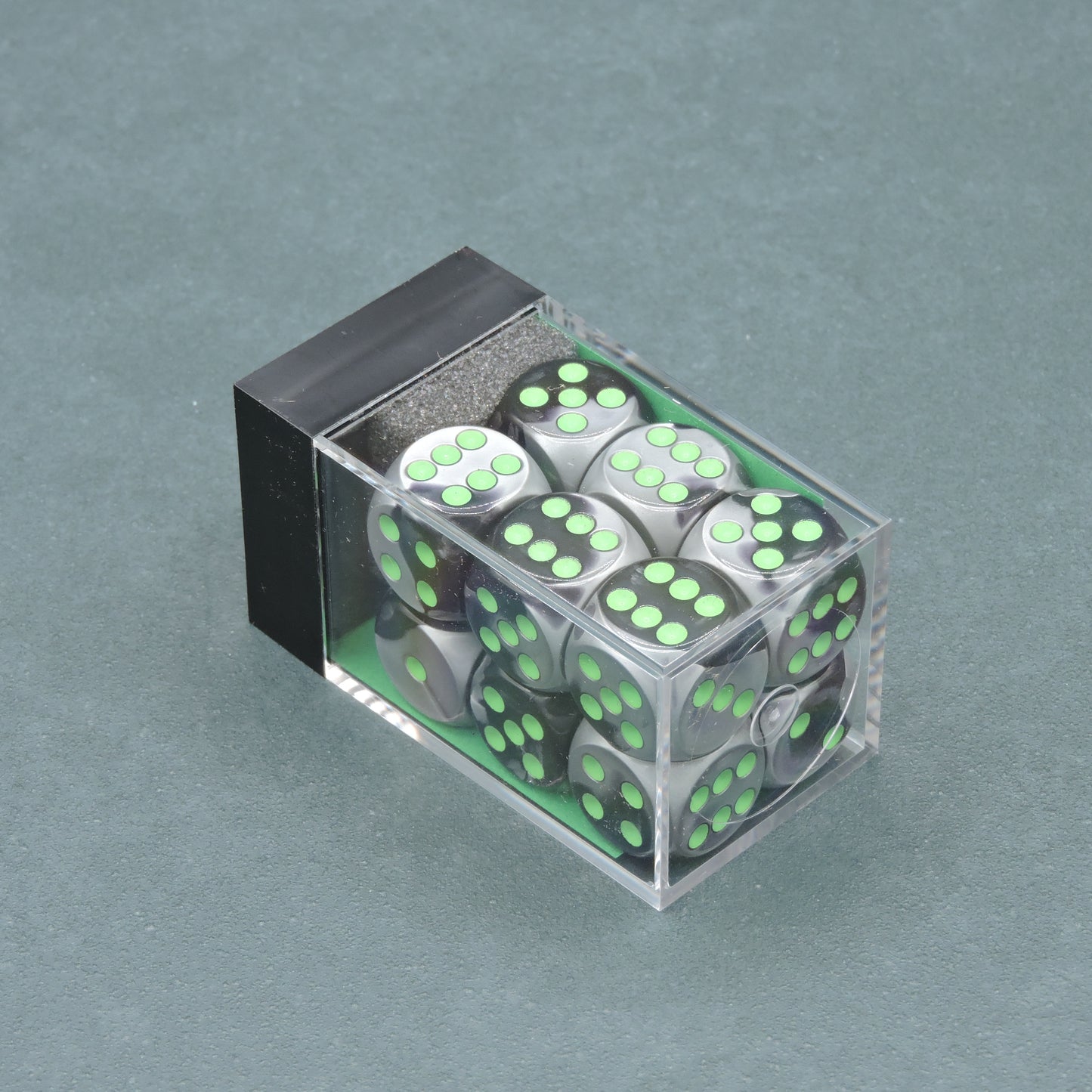 Black-Grey w/ green Gemini 16mm d6 Dice Block (12 dice)